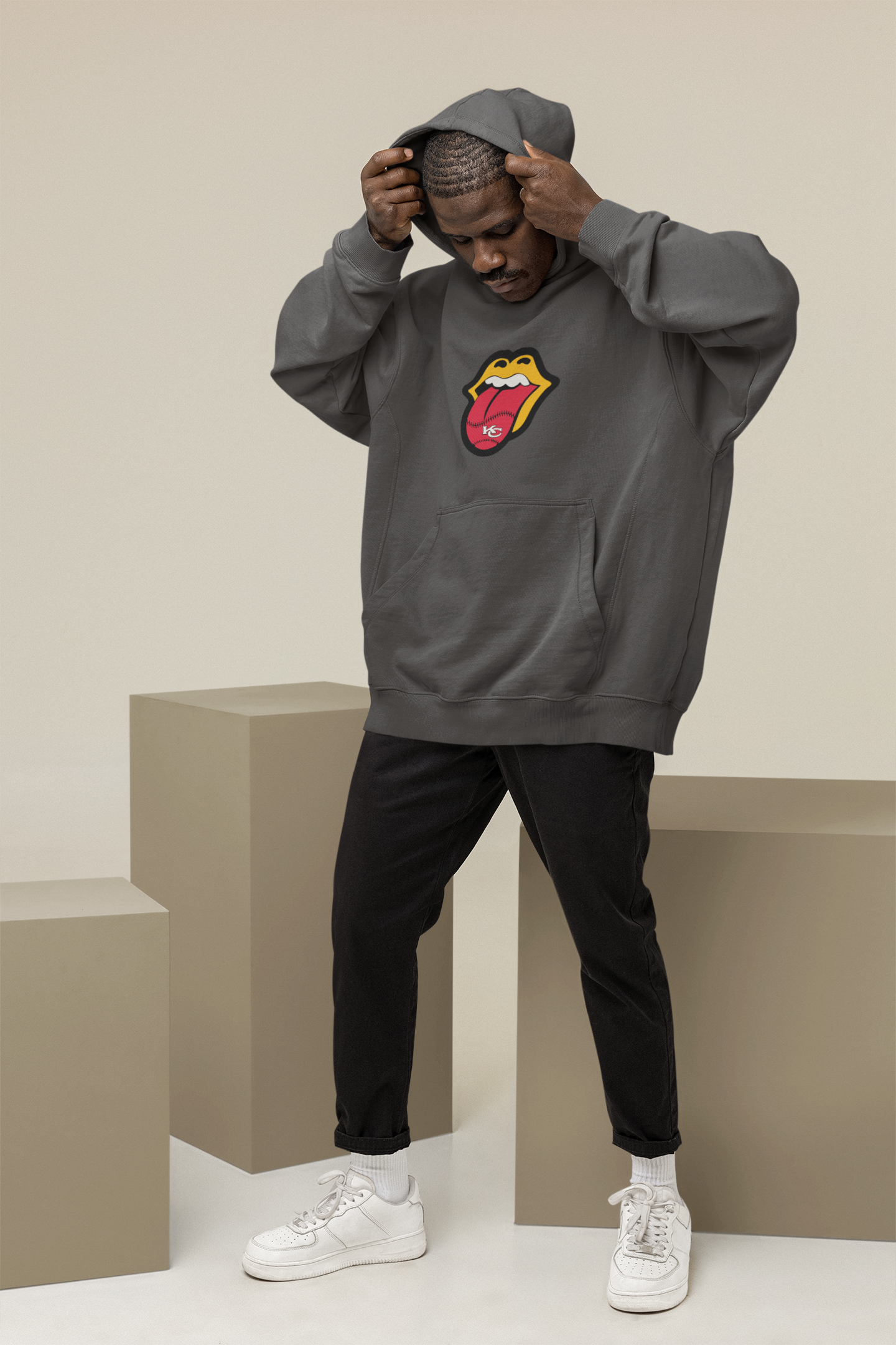 hoodie-mockup-featuring-a-man-posing-at-a-studio-with-colorful-cubes-m26650.png